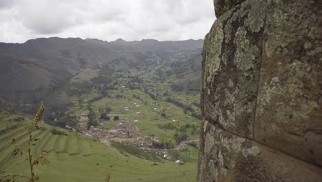 View-over-the-Ancient-Inca-terraces-and-ruins-at-the-Pisac-Archaeological-Park-in-Pisac,-Cuzco-Region,-Peru