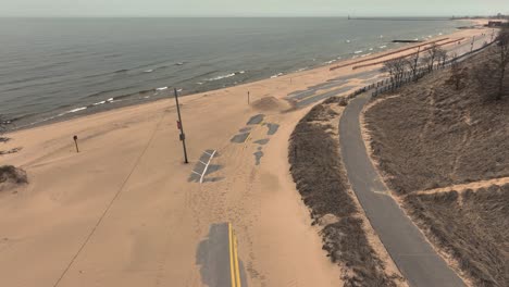 a sandy storm across the springtime beach