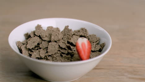 Piece-of-strawberry-falling-in-super-slow-motion