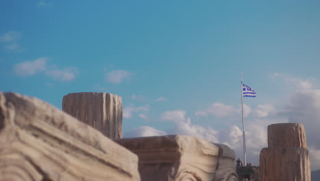 ancient ruins in greece, focus change to greek flag