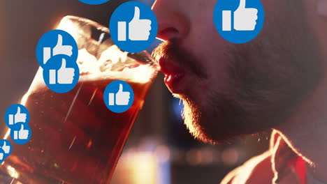 animation of like icons over cauacasian man drinking beer