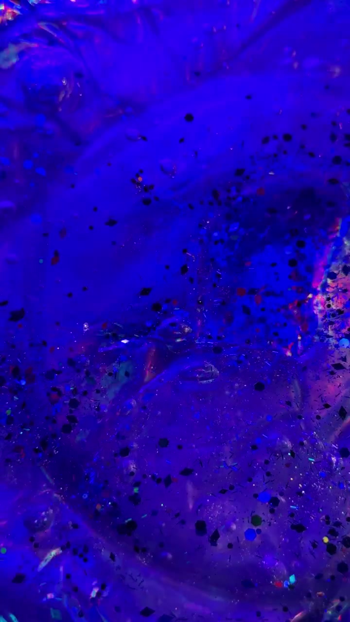 Glitter in una texture di slime colorata