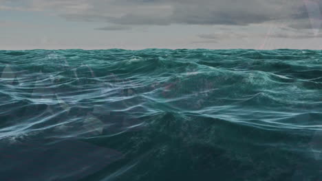 animation of rough ocean waves with geometric patterns under cloudy sky