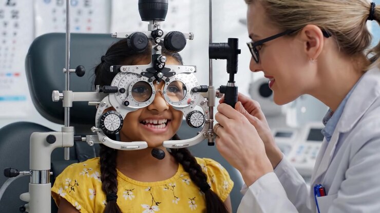 A Young Girl Undergoing an Eye Examination in a Modern Optometry Clinic, Wearing Specialized Glasses for a Comprehensive Vision Test