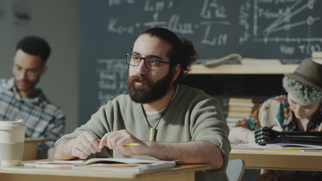 Diverse students engaging in a classroom discussion at university