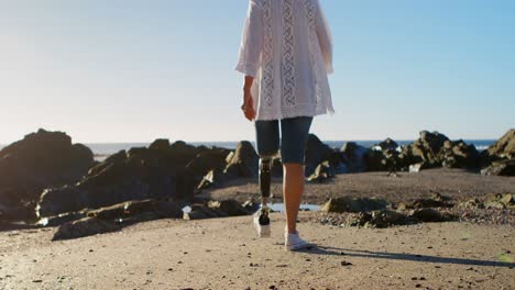 Disabled-woman-walking-in-the-beach-4k