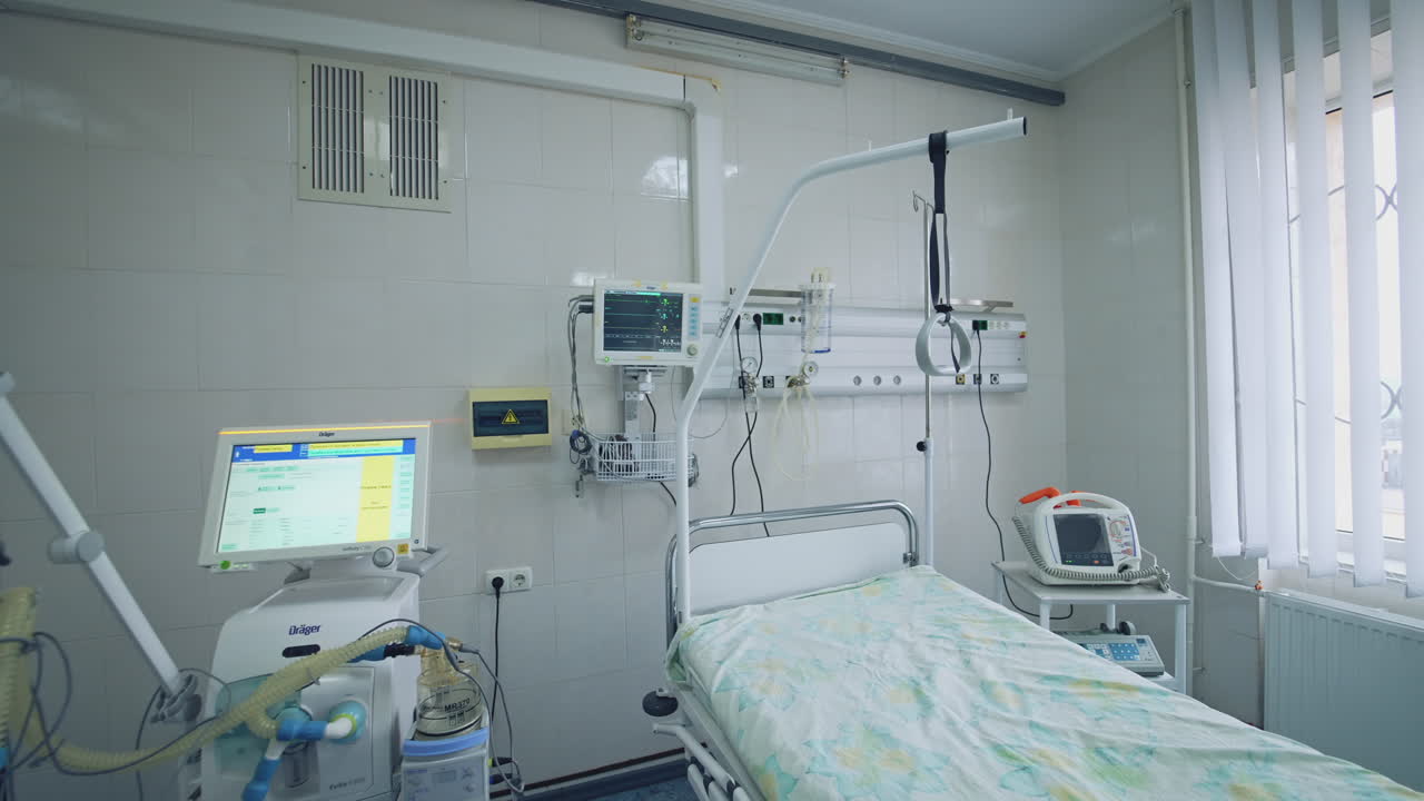 Recovery Room With Bed. Hospital room with beds and comfortable medical equipment in a modern hospital