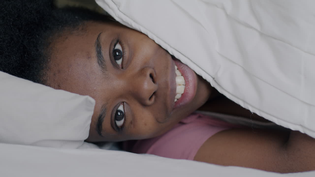 Woman Covered in Blanket
