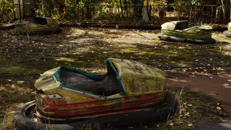 moldy and rusty abandoned bump cars because of nuclear disaster, pripyat