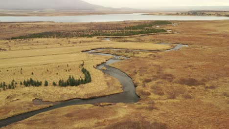 Panoramic-shot-of-tributary-river-and-Laugarvatn-lake-in-Iceland-golden-circle