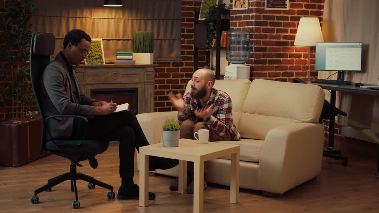 Man talking about conflict at counseling session with therapist