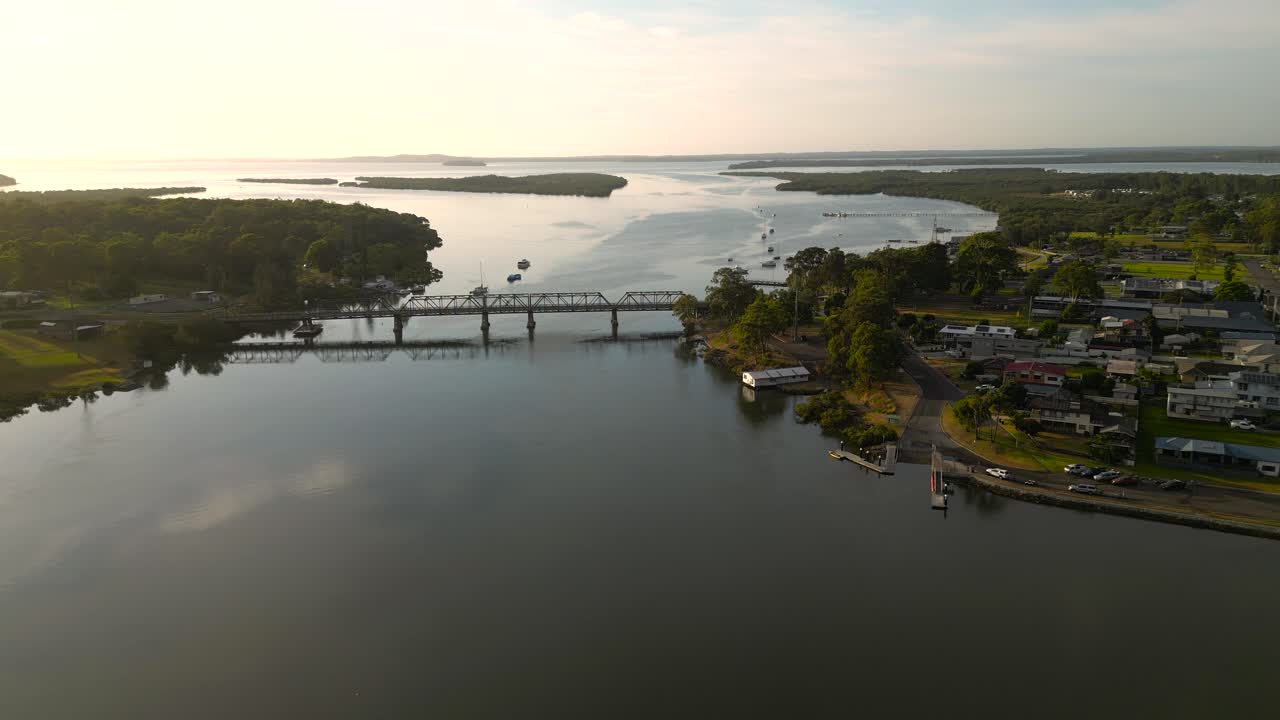Sunrise aerial view approaching the bridge in the regional town of Karuah, New South Wales, Australia.