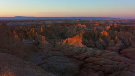 dramatic desert canyon landscape at sunset