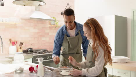 happy couple cracking eggs together in kitchen, enjoying holiday baking fun