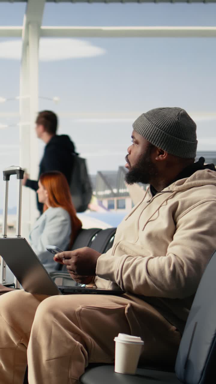 Vertical Video Unhappy Black Man Worried About Cancelled Airplane Departures