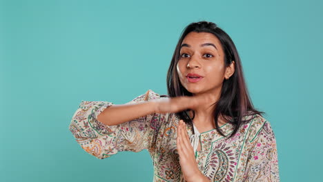 Portrait-of-assertive-woman-asking-for-timeout,-doing-hand-gestures