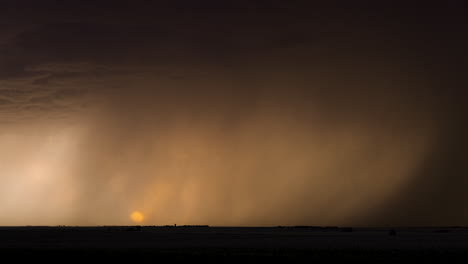 a bright colorful sunset with lightning striking the ground