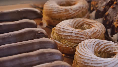 close-up of various pastries on a wooden counter