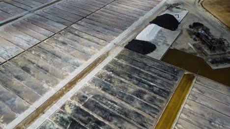 production of salt in massive fields near vietnam coastline, aerial view