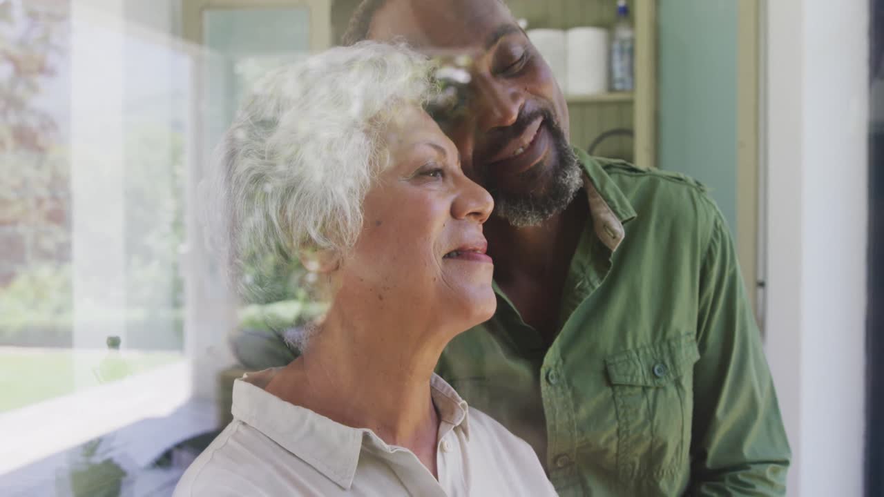 Senior African American husband and mixed race wife spending time together