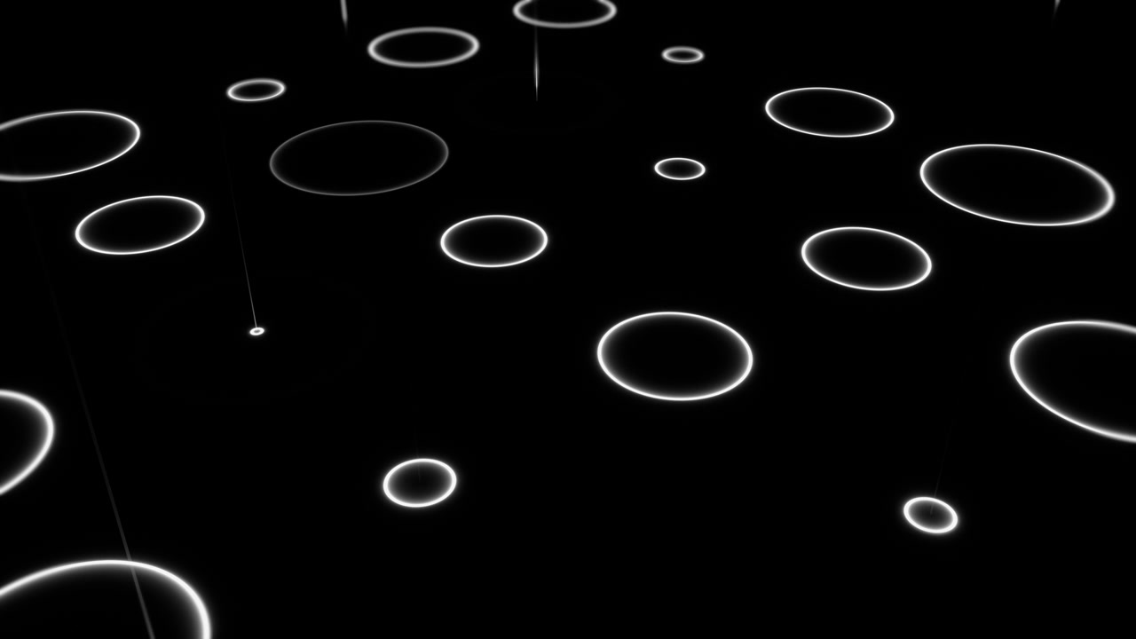 Abstracte gloeiende witte ringen en lijnen op zwarte achtergrond