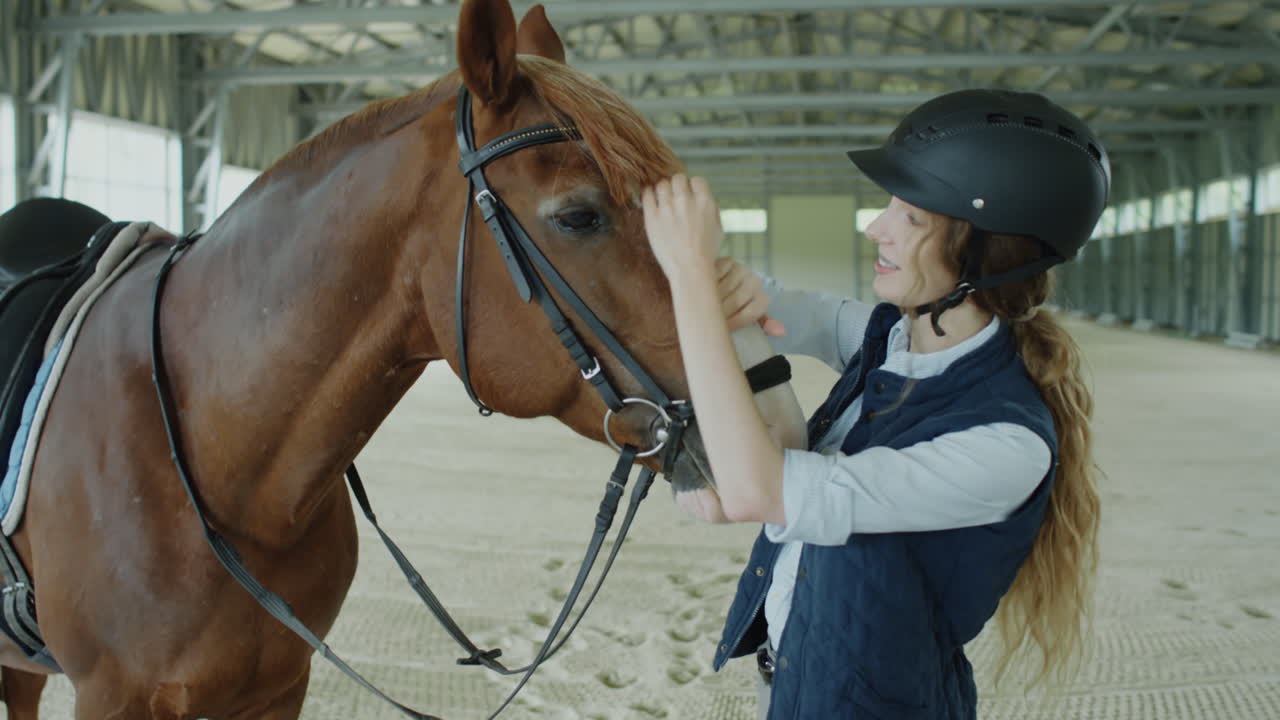 Female Rider Stroking Cute Horse