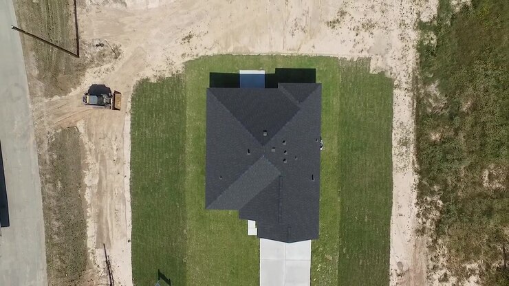 Overhead zoom out shot of new home in Cleveland, Texas area near Houston U.S.