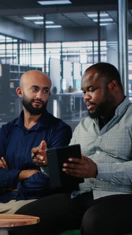 vertical video multicultural business leaders sharing expertise and developing a strategy