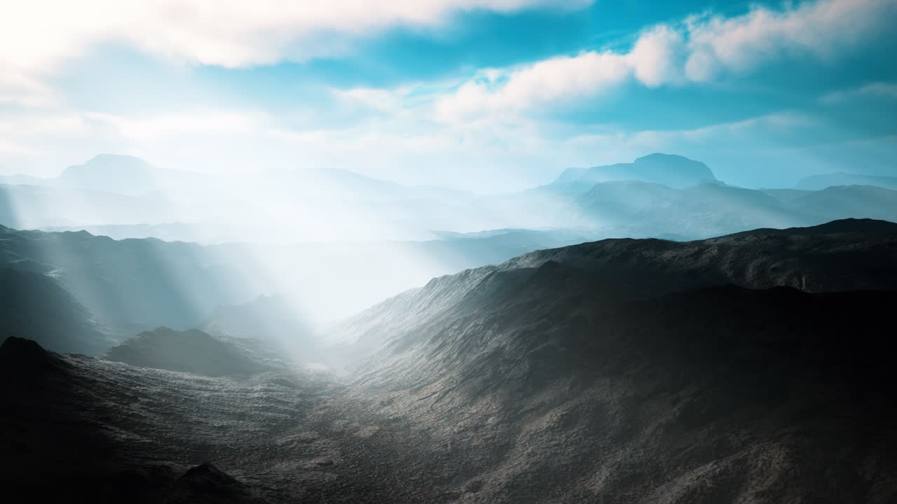 paisaje aéreo de desierto volcánico con rayos de luz