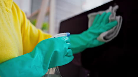 hands, television and cleaning screen in home