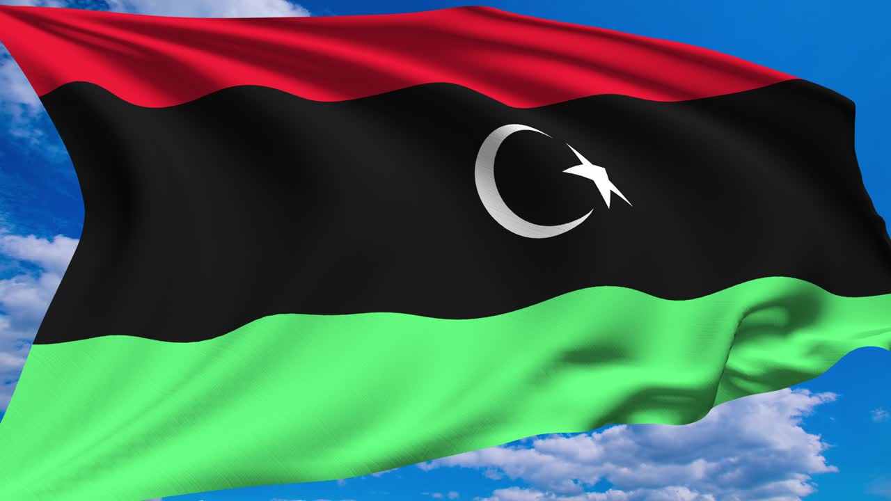 flag of Libya against a cloudy sky (alpha channel, loopable)