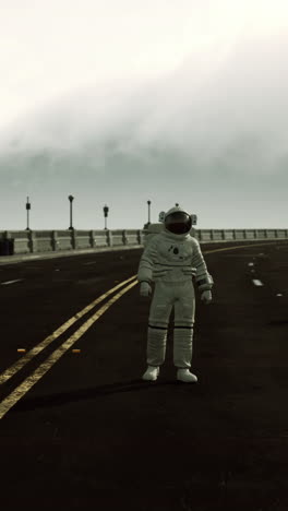 astronaut standing on a road in a futuristic cityscape