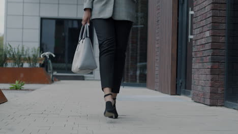 businesswoman walking to office