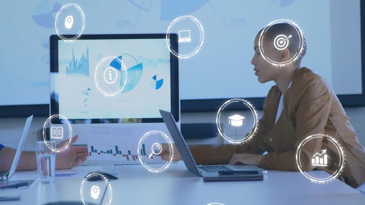 Animation of digital icons against diverse man and woman discussing over a document at office