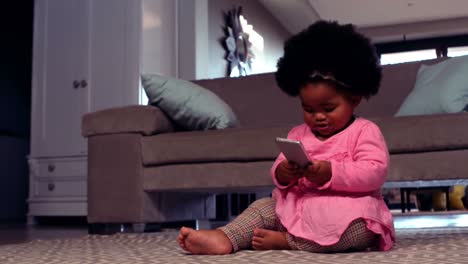 little girl playing on the floor