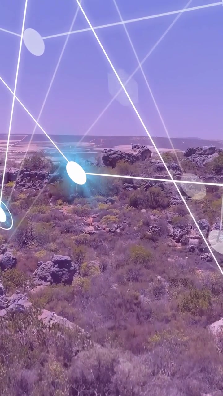 Video verticale: appare una griglia AR, la telecamera si allontana e si inclina, rivelando la mappatura di un affioramento roccioso.