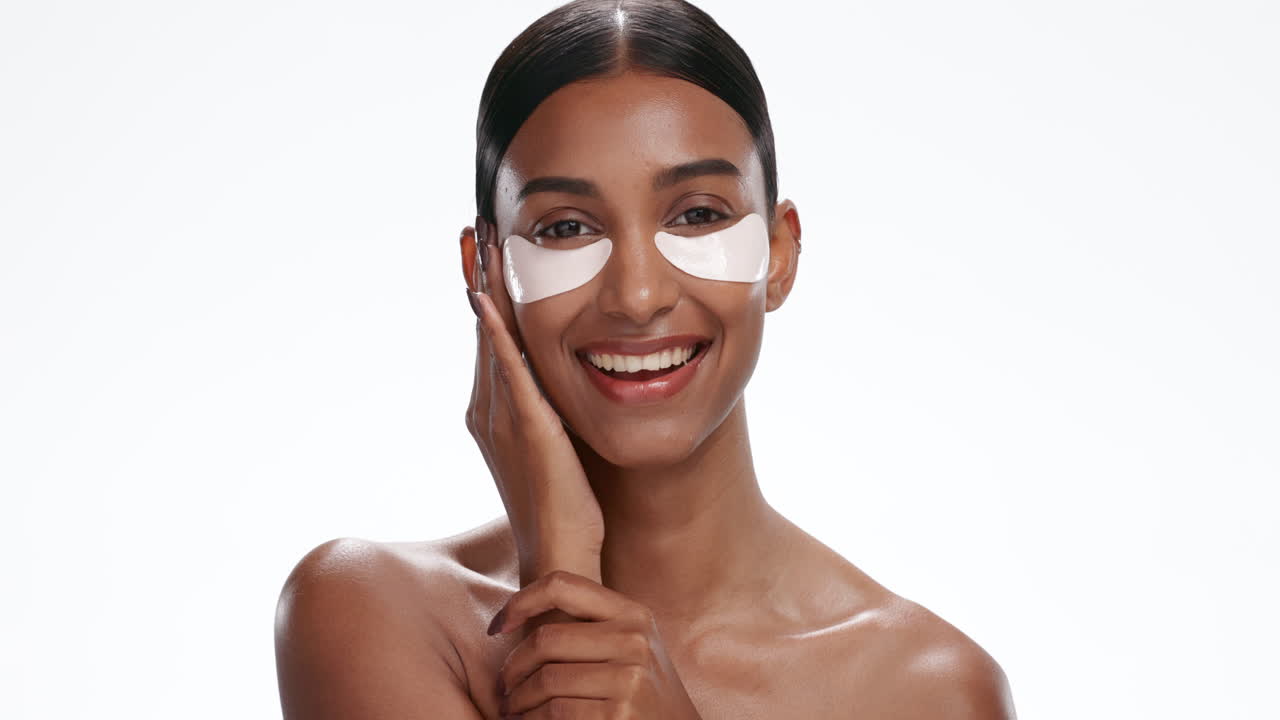 Face, eye patches and woman with skincare