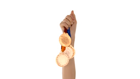 Manos-Lanzando-Algunas-Medallas