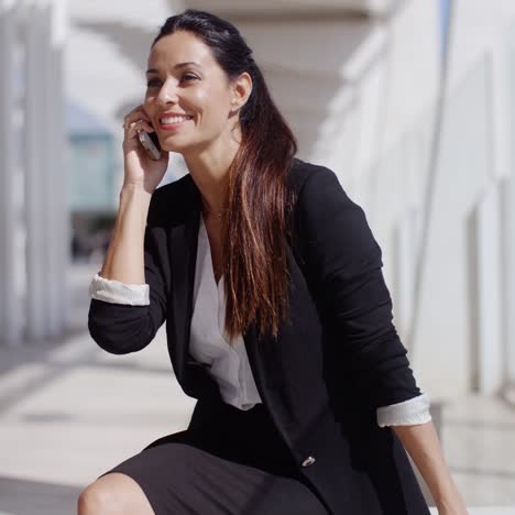 Businesswoman-taking-a-call-on-her-mobile