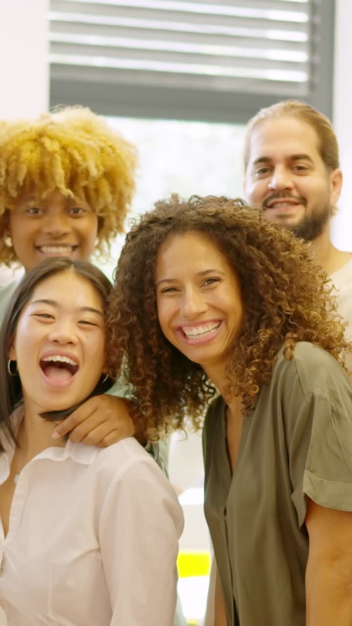 Group of multi-ethnic coworkers smiling at camera