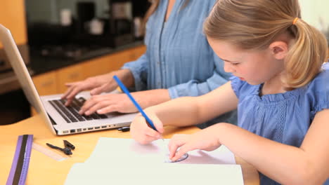 blonde girl using a protractor