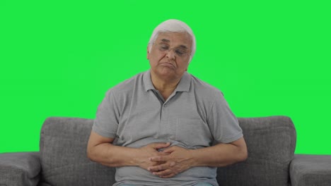 Sick-Indian-old-man-suffering-from-stomach-pain-Green-screen