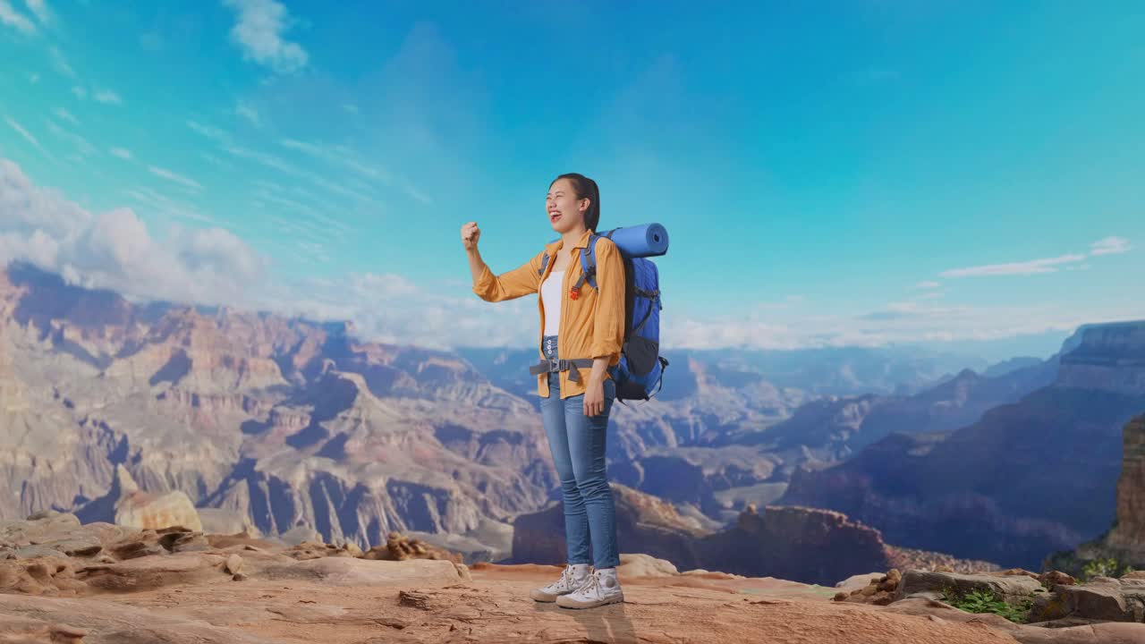 Full Body Side View Of Asian Female Hiker With Mountaineering Backpack Screaming Goal Celebrating The Success While Traveling At The Top Of Mountain