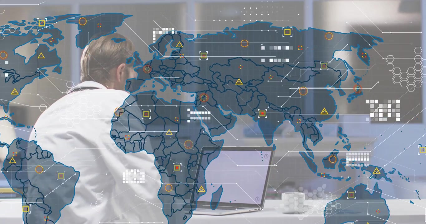 Medical professional leaning over laptop as world map fading into view, monitoring alert icons