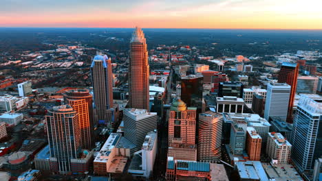 gorgeous architecture of beautiful metropolis downtown in the pink light of sunset. top view on charlotte, north carolina, usa with amazing horizon at backdrop