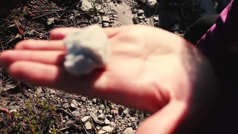 woman, exploring the stones of table mountain