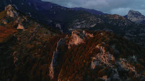 golden autumn sunlit colours campania rocky lush woodland mountain valleys, rising aerial view