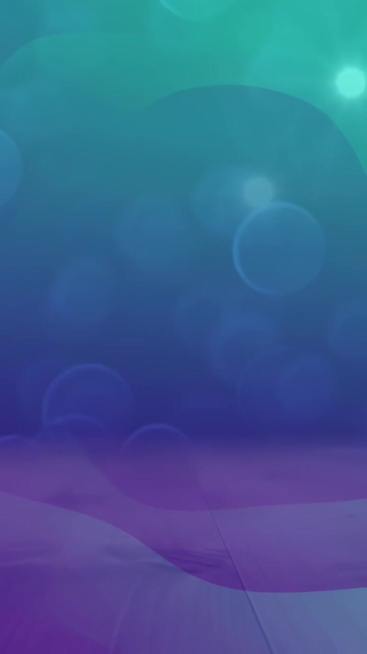 Video verticale: Al caricamento, bokeh sfumato color verde acqua che si riempie, si muove, pulsa, si stabilizza, creando uno sfondo.