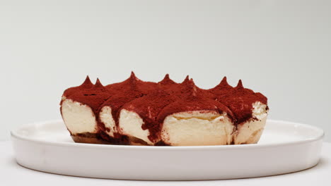 tiramisu dessert on a white plate