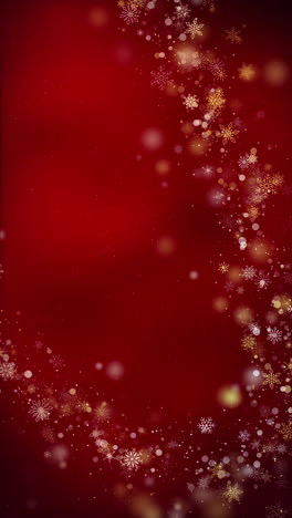 christmas festive frame with snowflakes. gold glitter texture. winter background. shining golden snowflakes on a red background. vertical video.